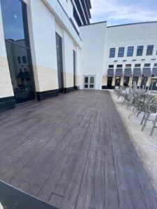 Wood stamped concrete overlay